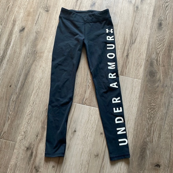 Black under armour leggings with the word under armour on the side - Picture 1 of 1